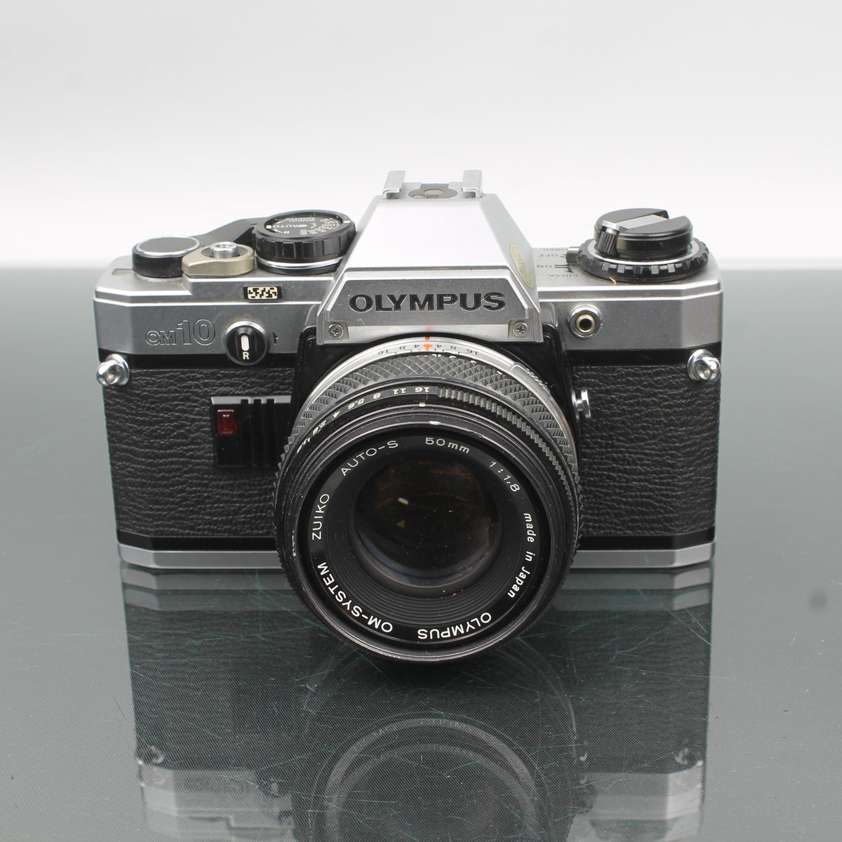Olympus OM 10 35mm SLR Film Camera with Zuiko 50mm f/1.8 – Dutch