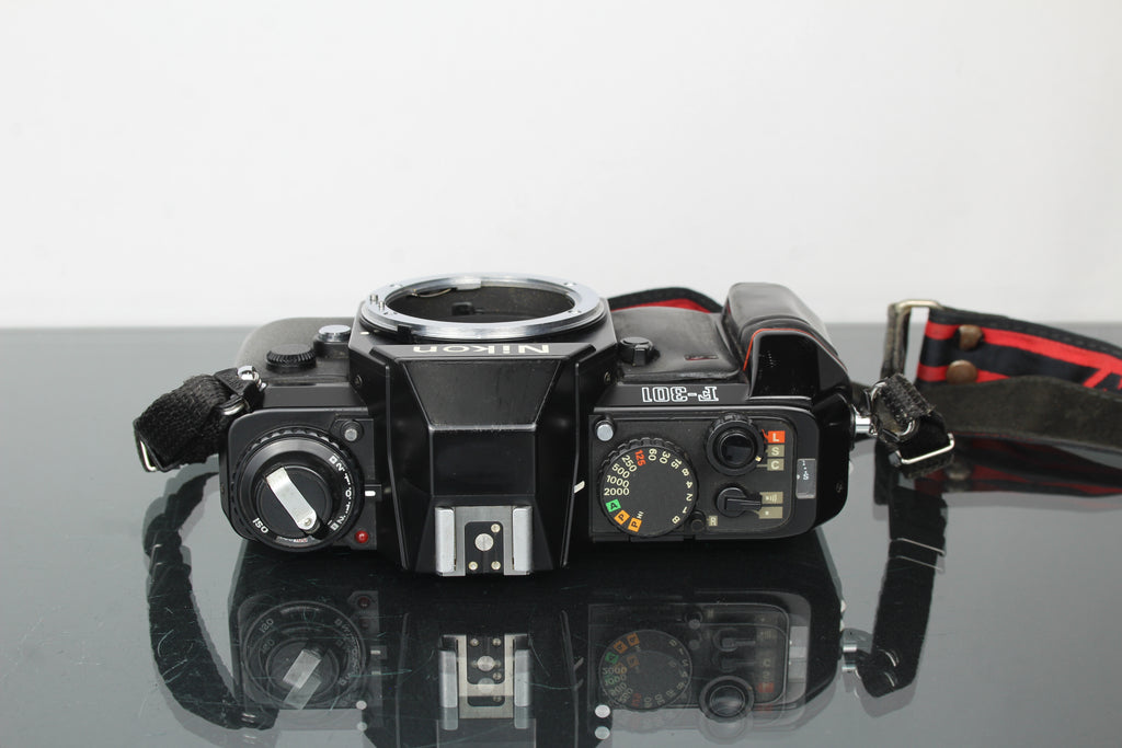 Nikon F-301 + 80-200mm 1:4.5 Tokina lens