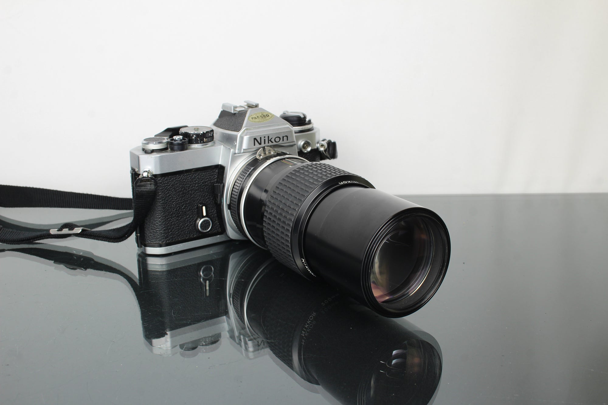 Nikon FE + Nikkor 200mm 1:4 lens