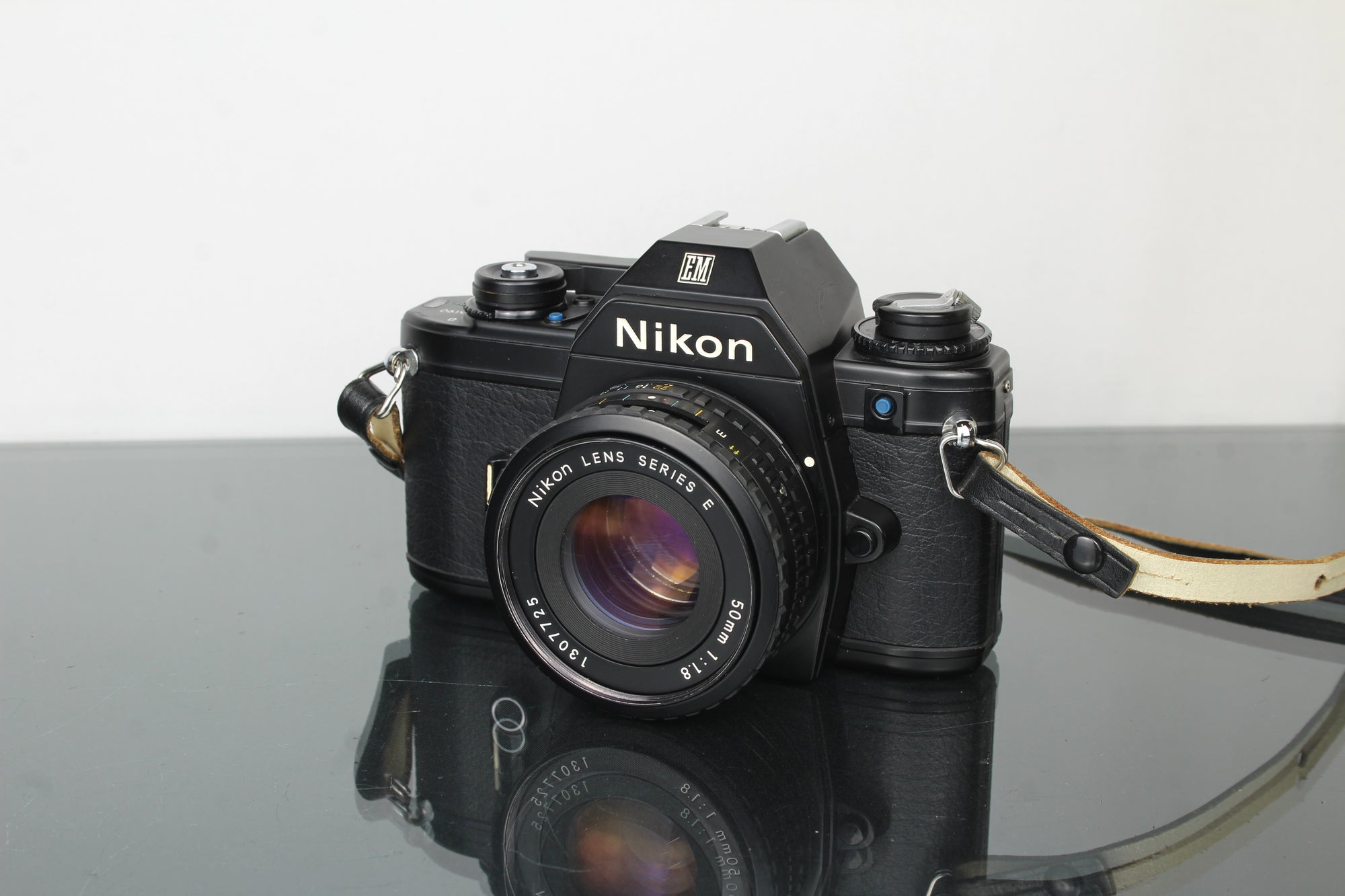 Nikon EM + Nikon E 50mm 1:1.8 Nikon F-mount lens