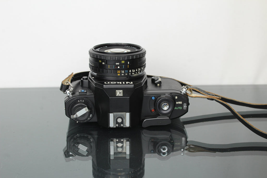 Nikon EM + Nikon E 50mm 1:1.8 Nikon F-mount lens