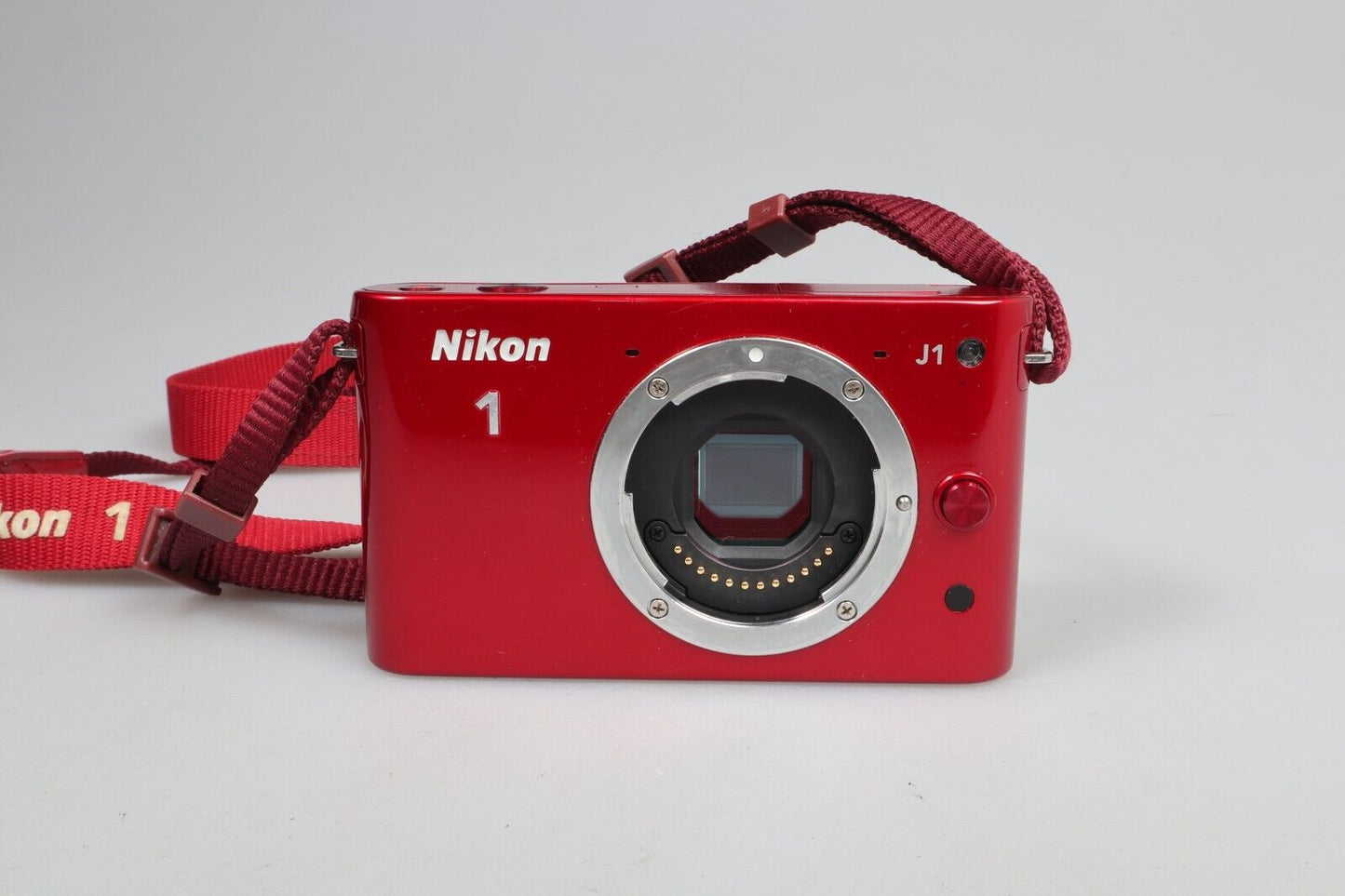 Nikon 1 J1 | Cámara de sistema compacto | Sólo cuerpo | Rojo