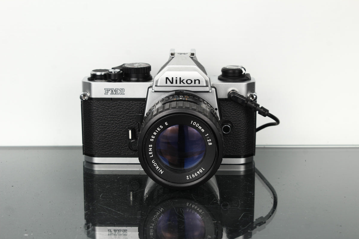 Nikon FM2 + Nikon E 100mm 1:2.8