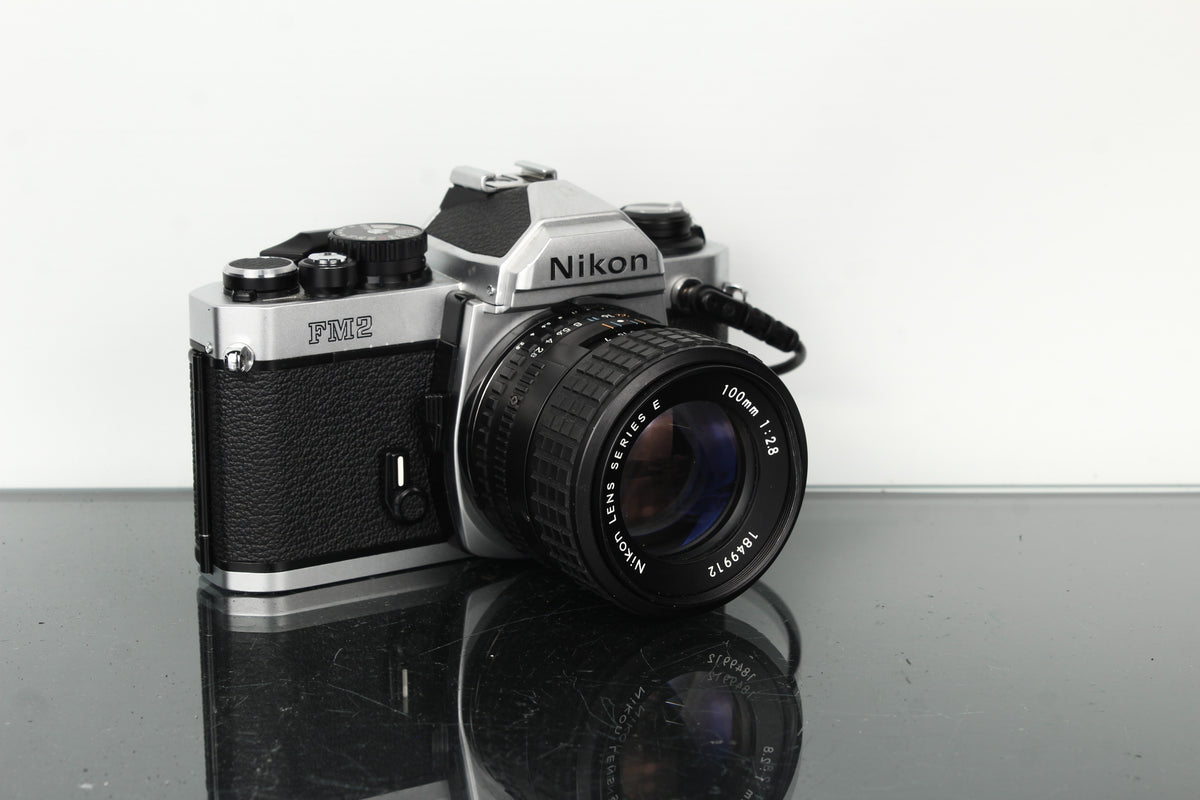Nikon FM2 + Nikon E 100mm 1:2.8
