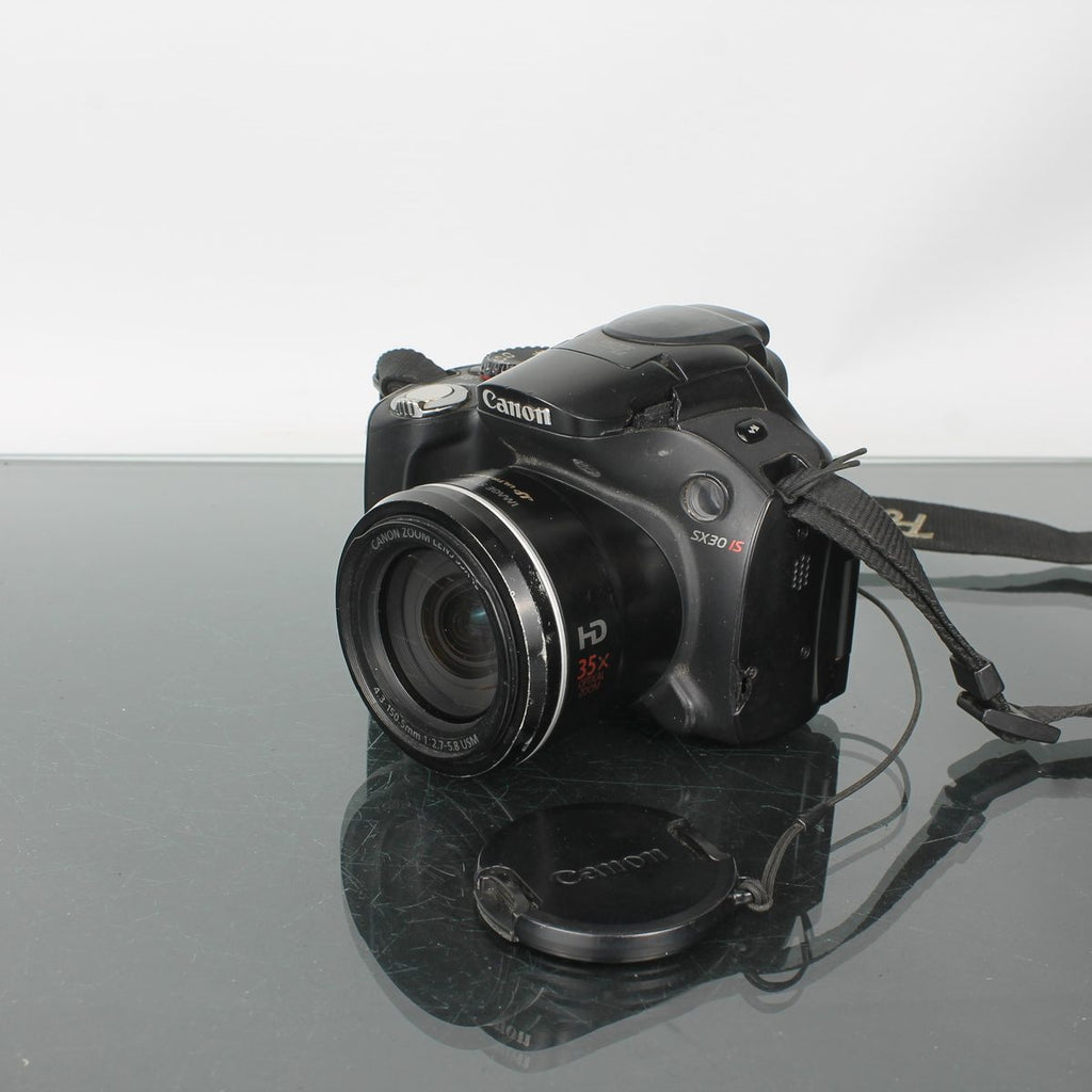 Canon SX30 IS + Canon 4.3-150.5mm 1:2.7-5.8