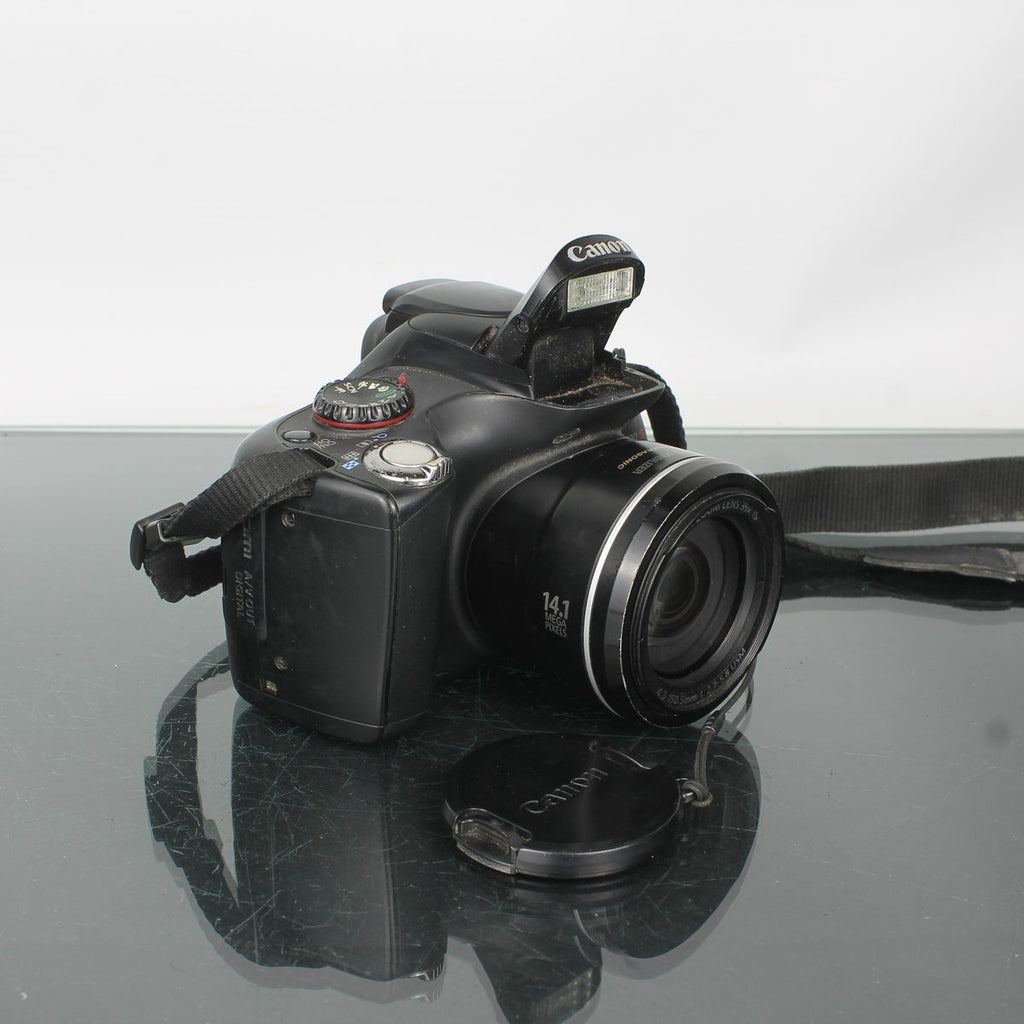 Canon SX30 IS + Canon 4.3-150.5mm 1:2.7-5.8