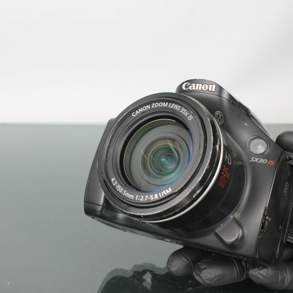 Canon SX30 IS + Canon 4.3-150.5mm 1:2.7-5.8