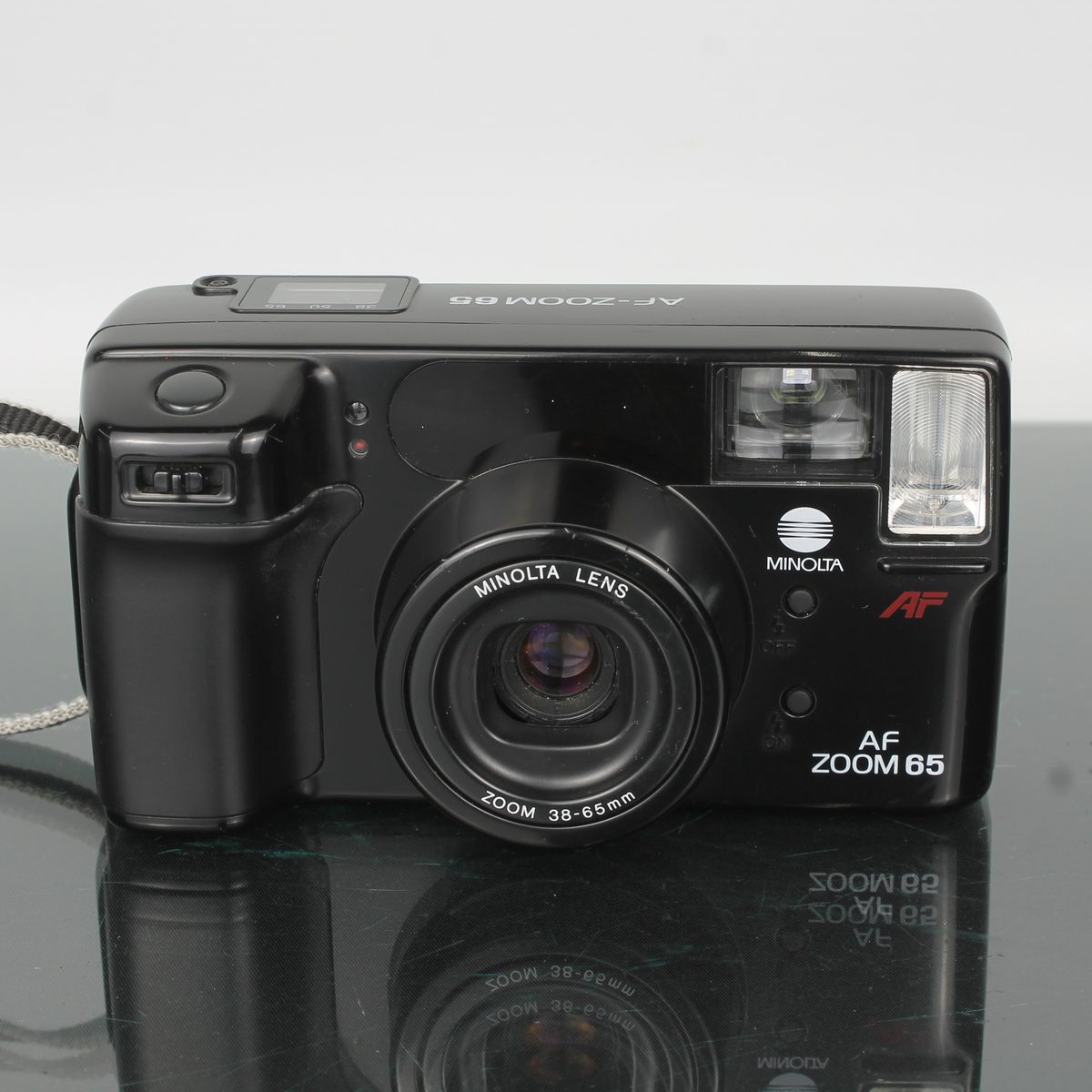AF Zoom 65 + Minolta Lens Zoom 38-65mm