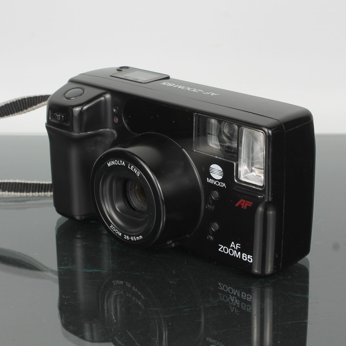 AF Zoom 65 + Minolta Lens Zoom 38-65mm