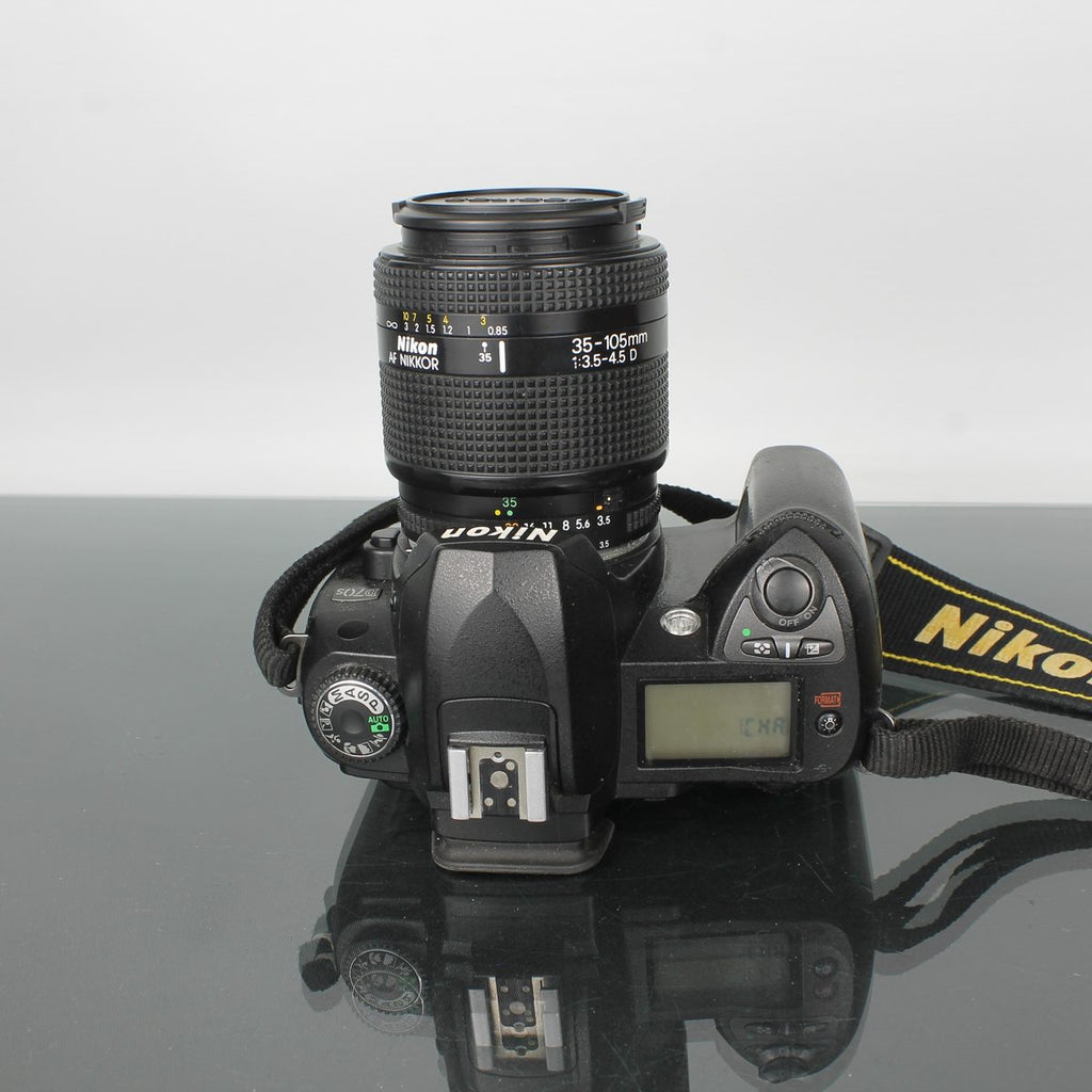 Nikon D70s + Nikon AF Nikkor 1:3.5-4.5 35-105mm