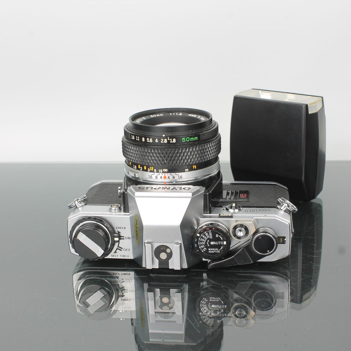 Olympus OM-10 Film Camera Kit with Zuiko 50mm f/1.8 Lens – Dutch