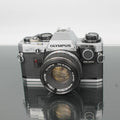 Olympus OM-10 + Olympus OM-System Auto-S 1:1.8 f=50mm