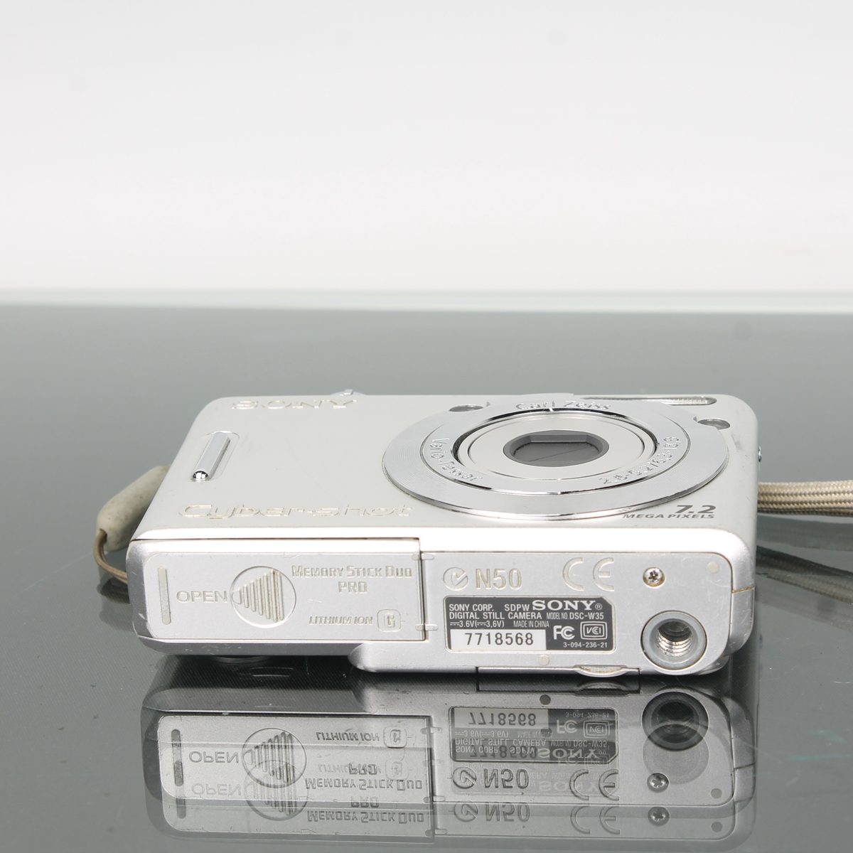 Sony Cyber-shot DSC-W35 7.2MP Digital Camera + Universal Charger