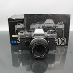 Olympus OM 10 + Olympus OM 50mm 1:1.8