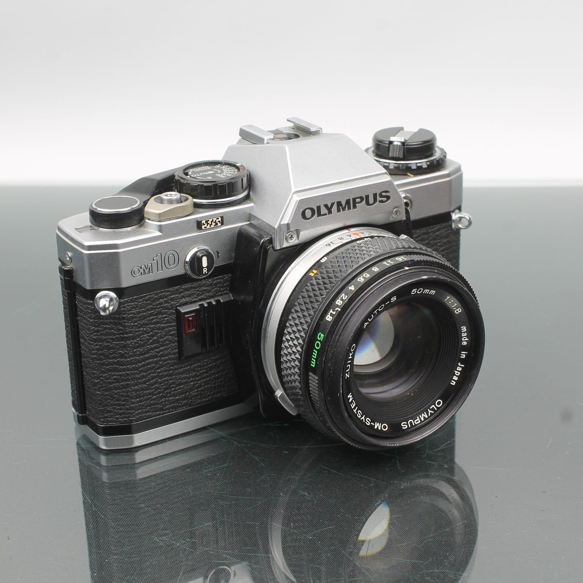 Olympus OM 10 35mm SLR Film Camera with Zuiko 50mm f/1.8 – Dutch