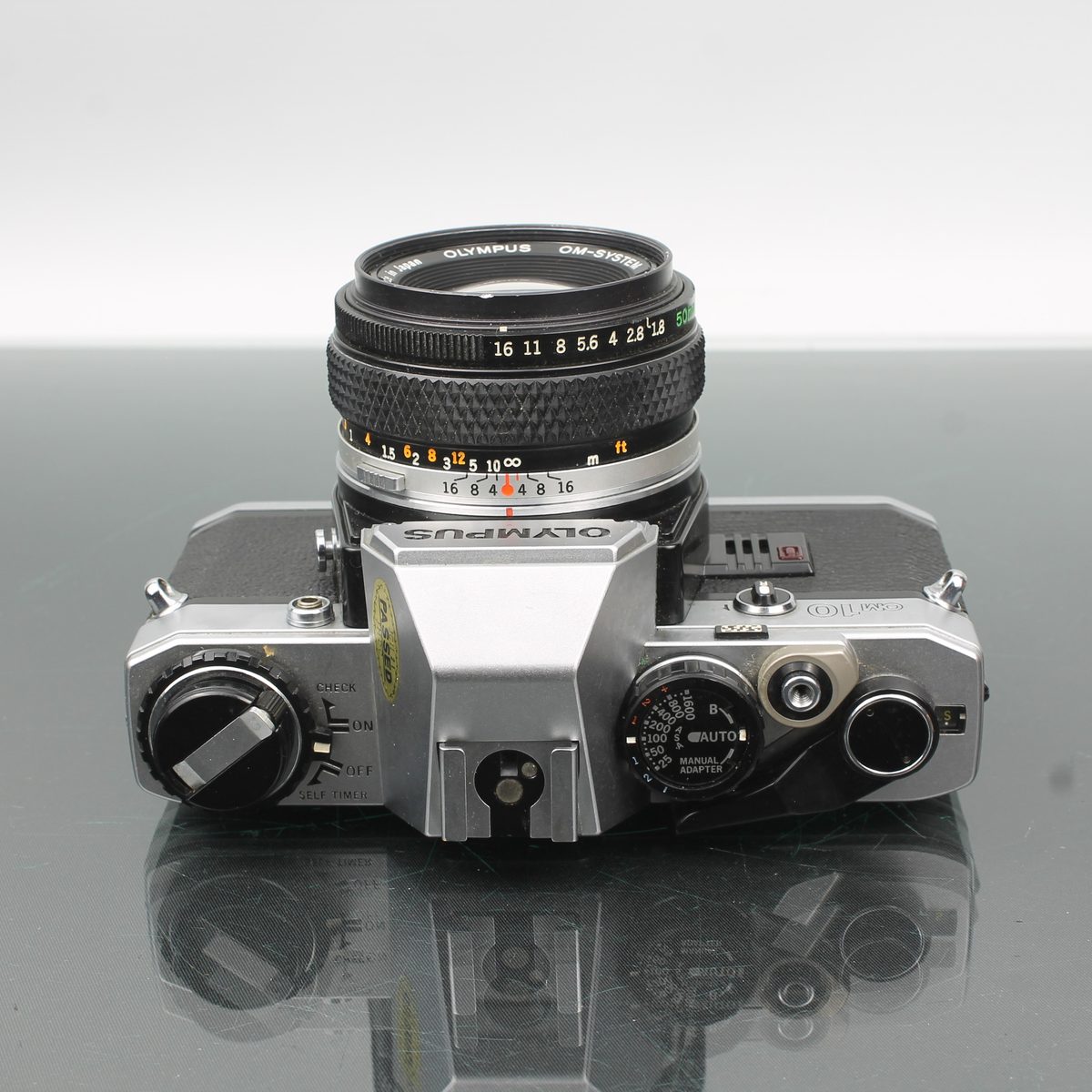 Olympus OM 10 35mm SLR Film Camera with Zuiko 50mm f/1.8 – Dutch