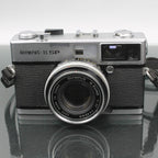 Olympus 35 SP + G. Zuiko 1:1.7 f=42mm