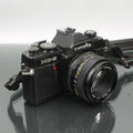 Minolta XG-E + MD 50mm 1:1.7