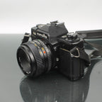 Minolta XG-E + MD 50mm 1:1.7