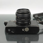 Minolta XG-E + MD 50mm 1:1.7