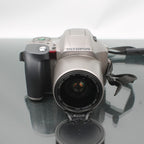 Olympus IS-300 + Olympus IS/L Lens C-180 H.Q. Converter 1.7x