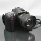 Nikon D70s + AF-S Nikkor 18-70 mm 13.5 - 4.5G ED