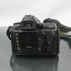 Nikon D70s + AF-S Nikkor 18-70 mm 13.5 - 4.5G ED