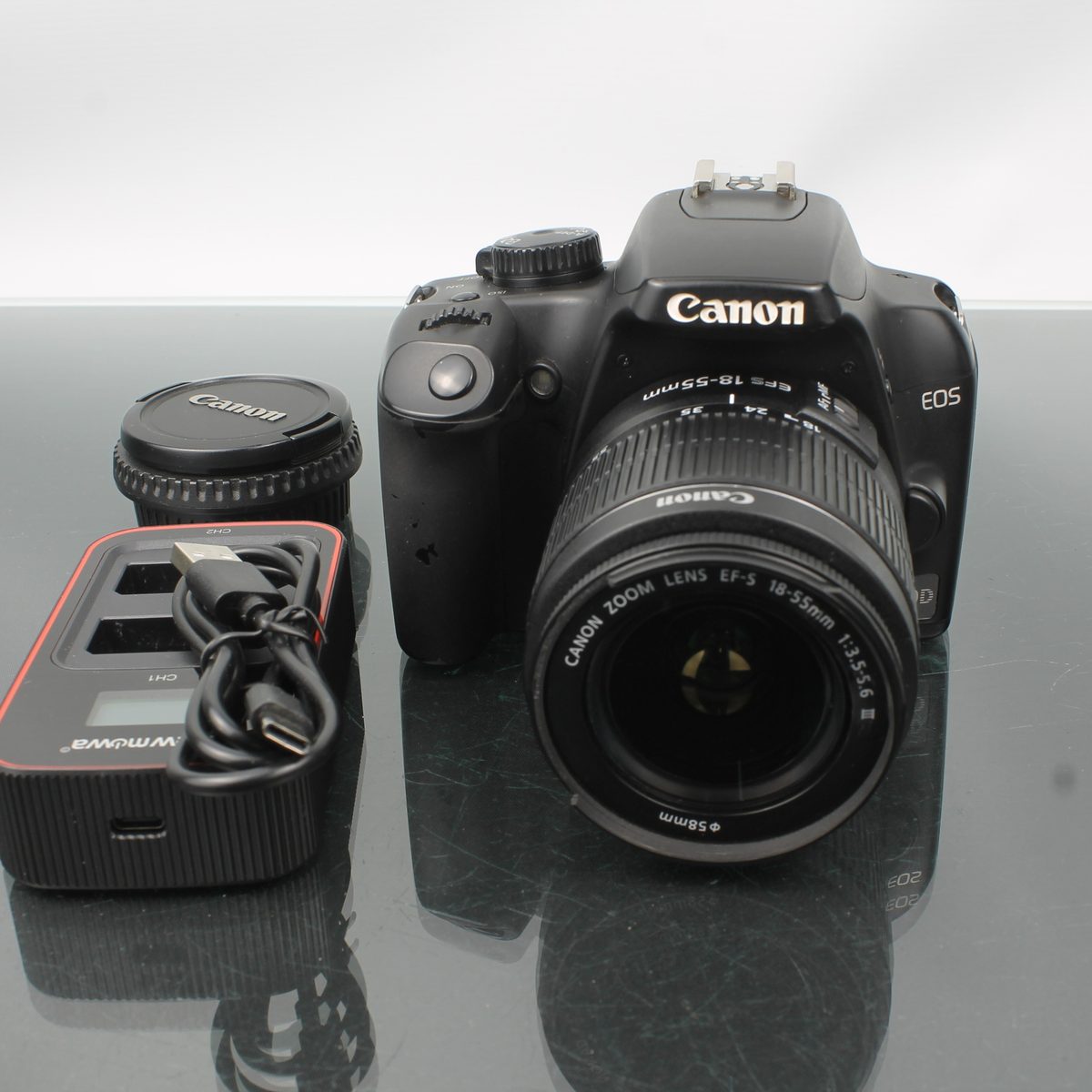 Canon EOS 1000D + Canon Zoom EF-S 18-55mm 1:3.5-5.6