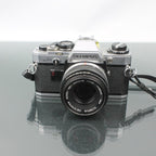 Olympus OM-10 + Olympus OM-System Zuiko MC Auto-S 1:1.8 f=50mm