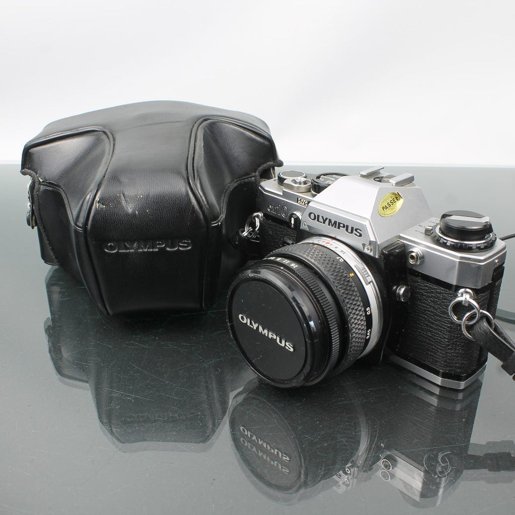 Olympus OM-10 + Olympus OM-System Zuiko MC Auto-S 1:1.8 f=50mm