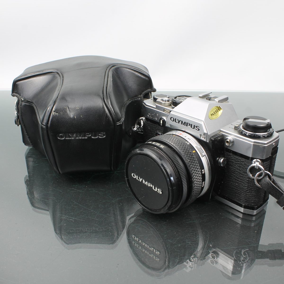 Olympus OM-10 + Olympus OM-System Zuiko MC Auto-S 1:1.8 f=50mm