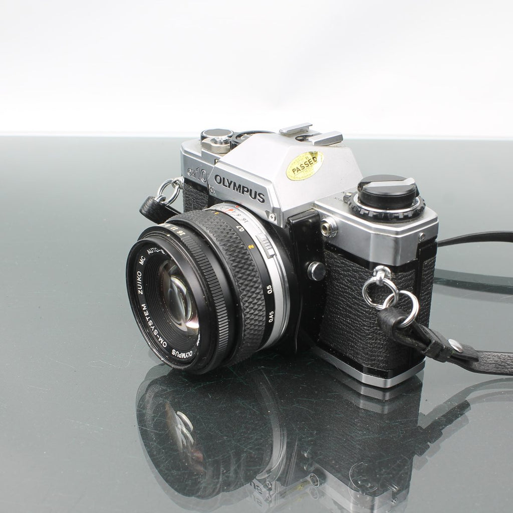 Olympus OM-10 + Olympus OM-System Zuiko MC Auto-S 1:1.8 f=50mm