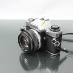 Olympus OM-10 + Olympus OM-System Zuiko MC Auto-S 1:1.8 f=50mm