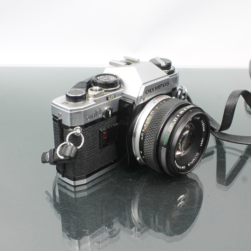 Olympus OM-10 + Olympus OM-System Zuiko MC Auto-S 1:1.8 f=50mm
