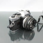 Olympus OM-10 + Olympus OM-System Zuiko MC Auto-S 1:1.8 f=50mm