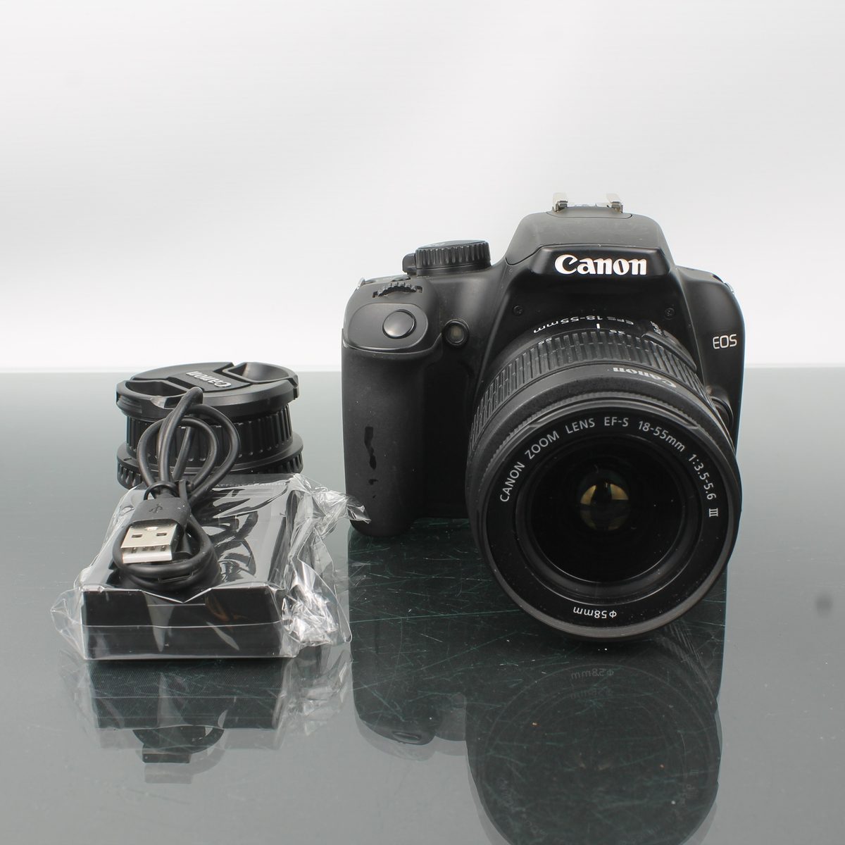 Canon EOS 1000D + EF-S 18-55mm f/3.5-5.6