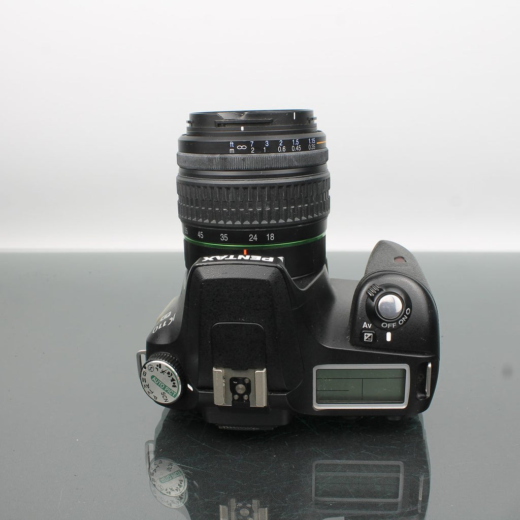 Pentax K110D + Pentax-DA 3.5-5.6 18-55mmAL