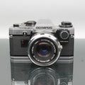 Olympus OM10 + Olympus OM F50mm 1:1.8