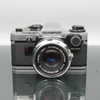 Olympus OM10 + Olympus OM F50mm 1:1.8