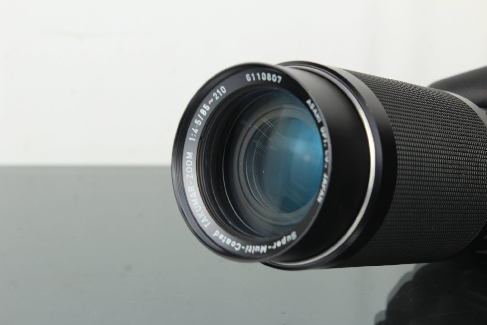 Asahi Takumar - Zoom Super - Multi - Coated 1:4.5/85 - 210 M42 mount - Dutch|Thrift