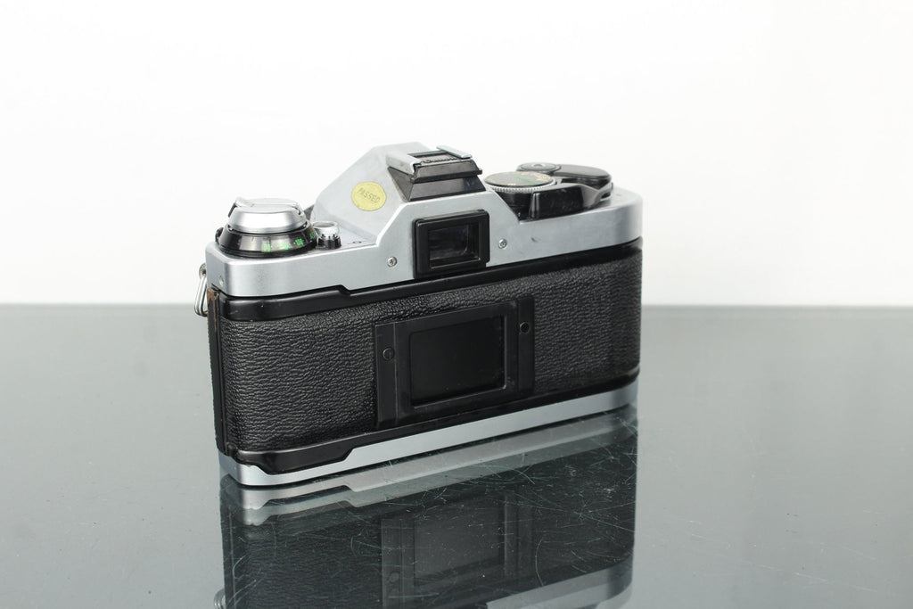 Canon AE - 1 + 50mm 1.8 Canon FD lens - Dutch|Thrift