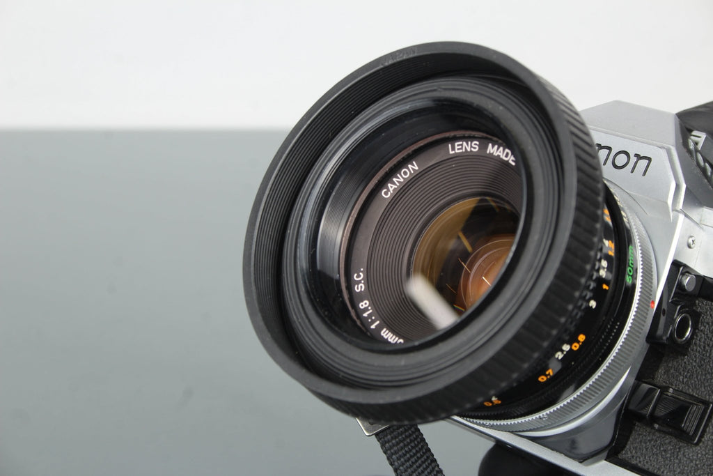 Canon AE - 1 + 50mm 1.8 Canon FD lens - Dutch|Thrift