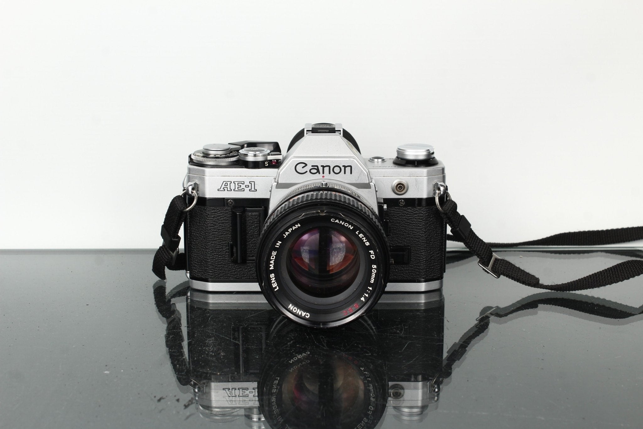 Canon AE-1 SLR Camera + FD 50mm f/1.4 S.C. Prime Lens Canon AE-1 SLR Camera + FD 50mm f/1.4 S.C. Prime Lens