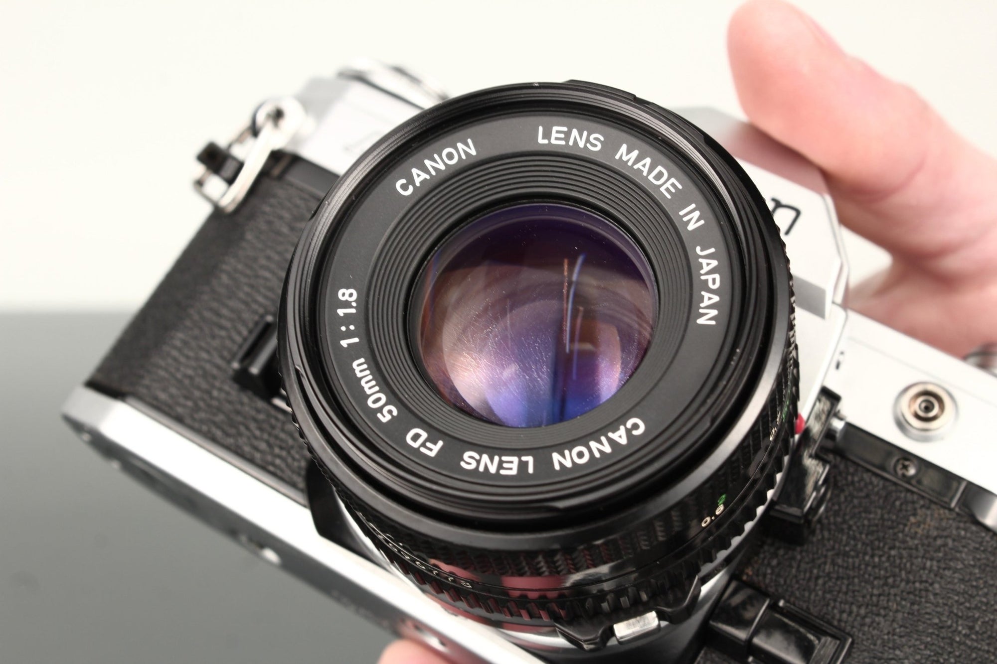 Canon AE - 1 + Canon FD 50mm f/1.8 - Dutch|Thrift