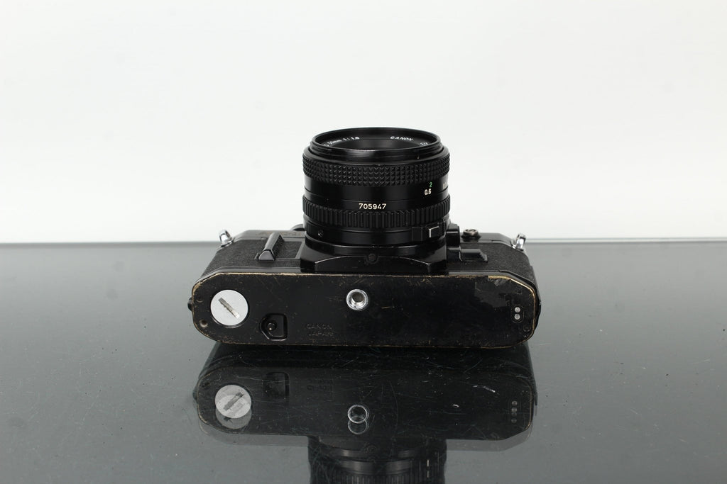 Canon AE - 1 + Canon Lens FD 50mm 1:1.8 - Dutch|Thrift