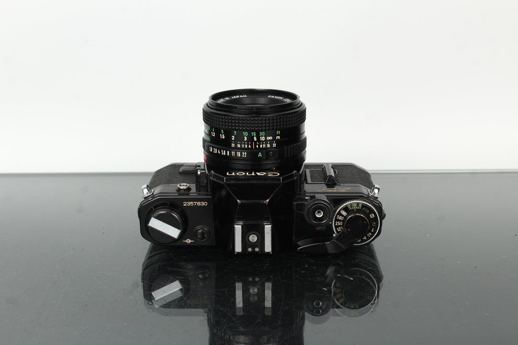 Canon AE - 1 + Canon Lens FD 50mm 1:1.8 - Dutch|Thrift
