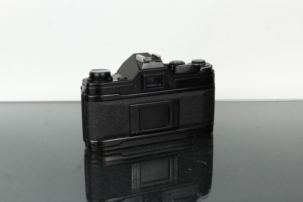 Canon AE - 1 + Canon Lens FD 50mm 1:1.8 - Dutch|Thrift