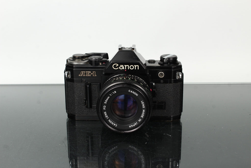 Appareil photo reflex argentique 35 mm Canon AE-1 FD 50mm f/1.4 S.S