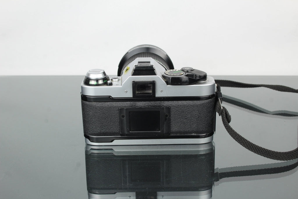 Canon AE - 1 Program + 35 - 105mm 1:3.5 Canon lens - Dutch|Thrift