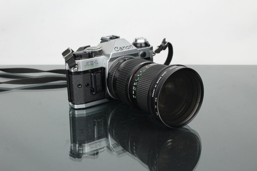 Canon AE - 1 Program + 35 - 105mm 1:3.5 Canon lens - Dutch|Thrift